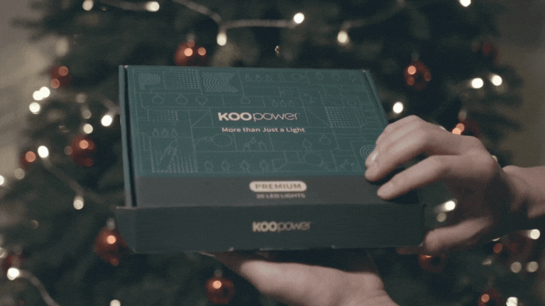 Open box of Koopower 30pcs LED Clip On Christmas Tree Candles (Battery-powered)